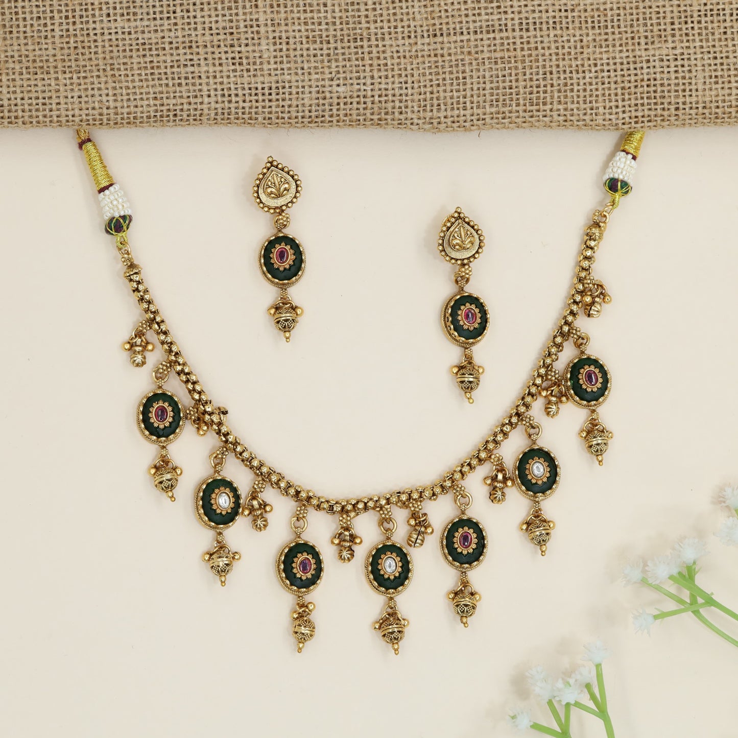 Station Style Kundan Necklace with Cascading Charm Accents