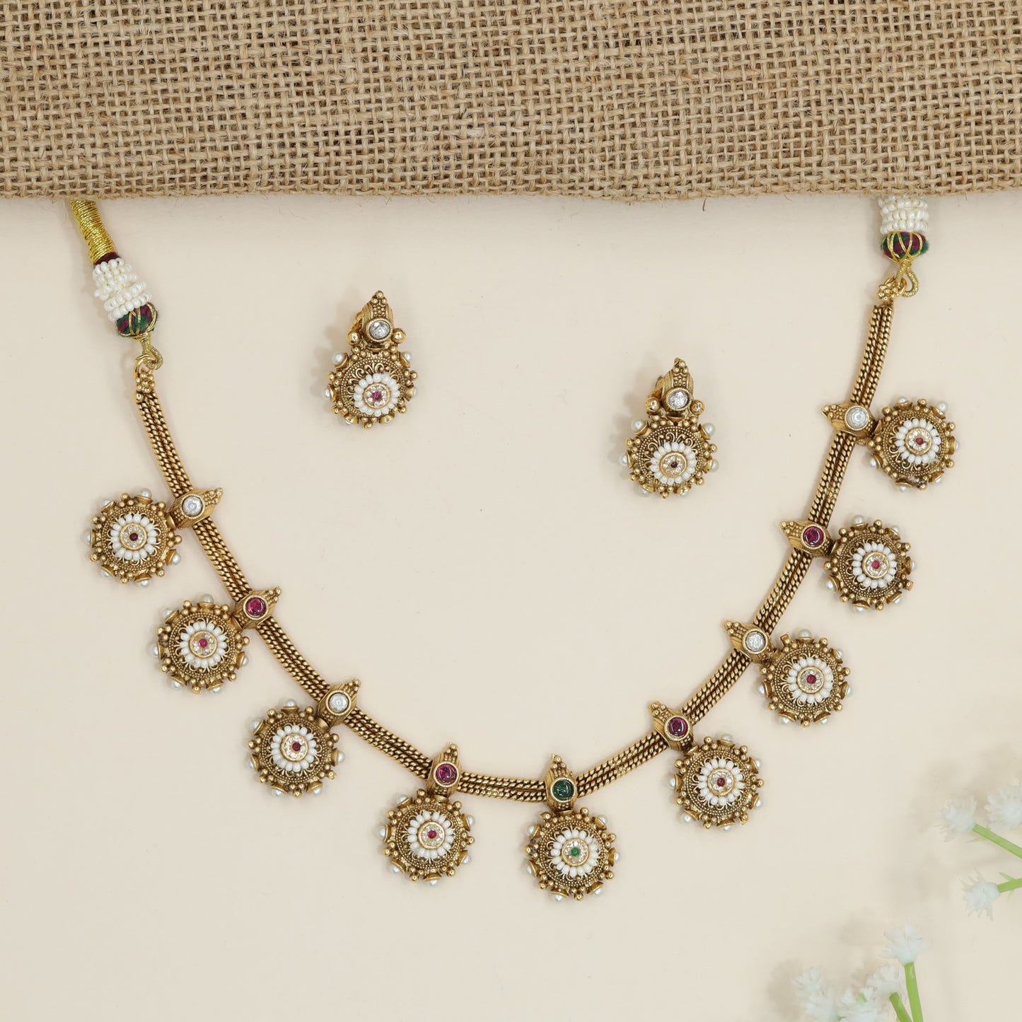 Medallion Drop Necklace with Rosette Motif Detailing