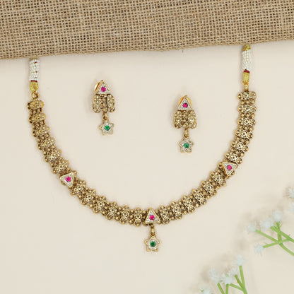 Artisan kundan necklace with repeating floral openwork pattern