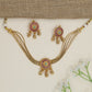 Festive disc motif choker with layered collar silhouette