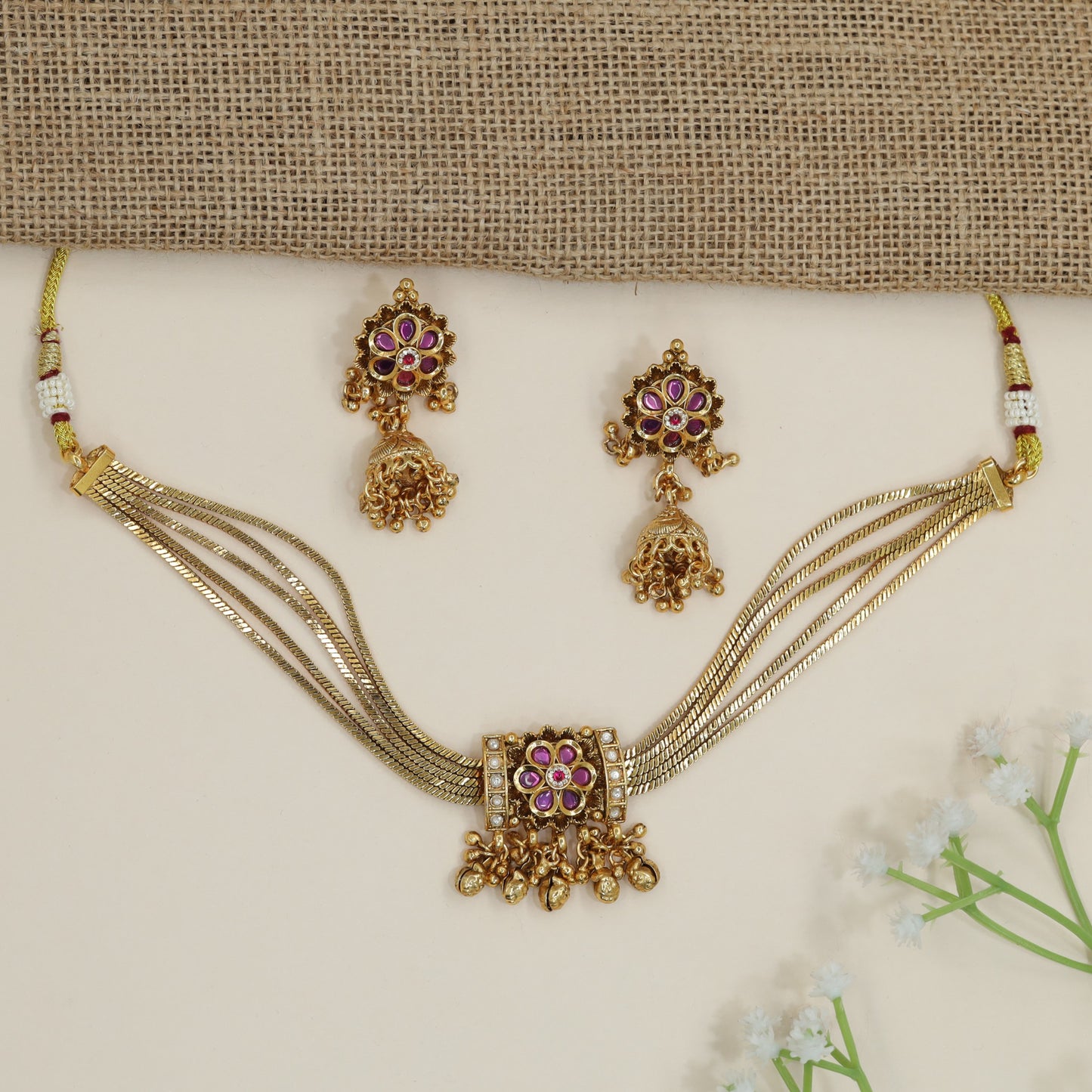 Multi-layer kundan choker with flower medallion centrepiece