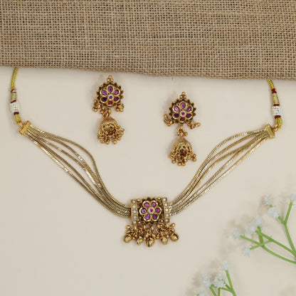 Multi-layer kundan choker with flower medallion centrepiece