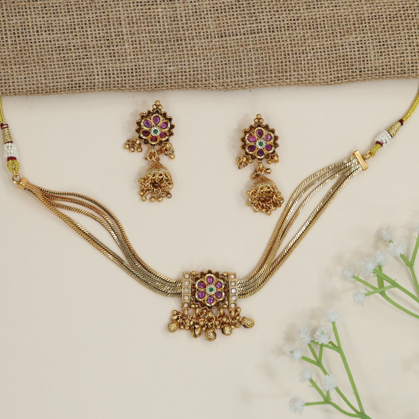 Multi-layer kundan choker with flower medallion centrepiece