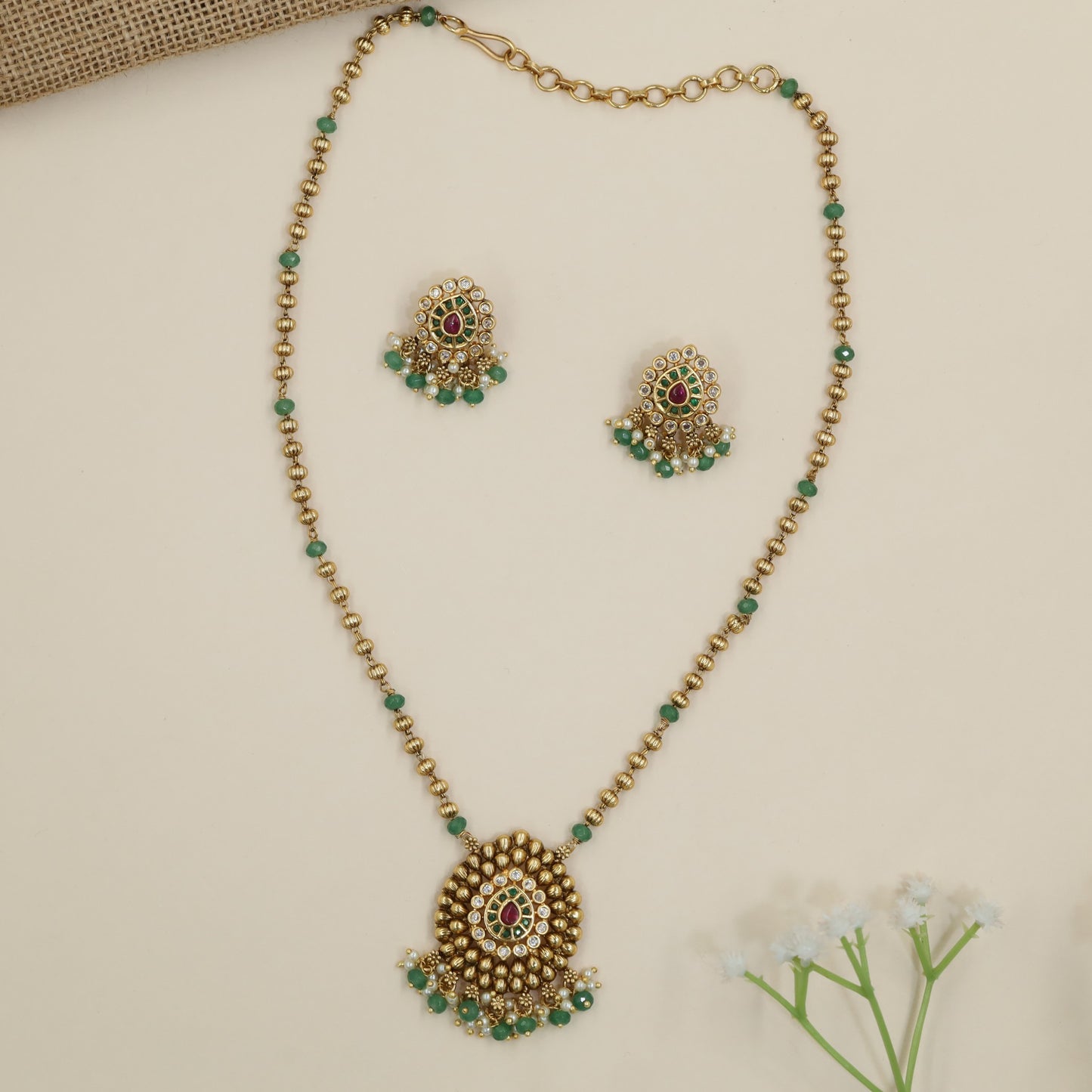 Traditional pendant necklace with concentric design detailing