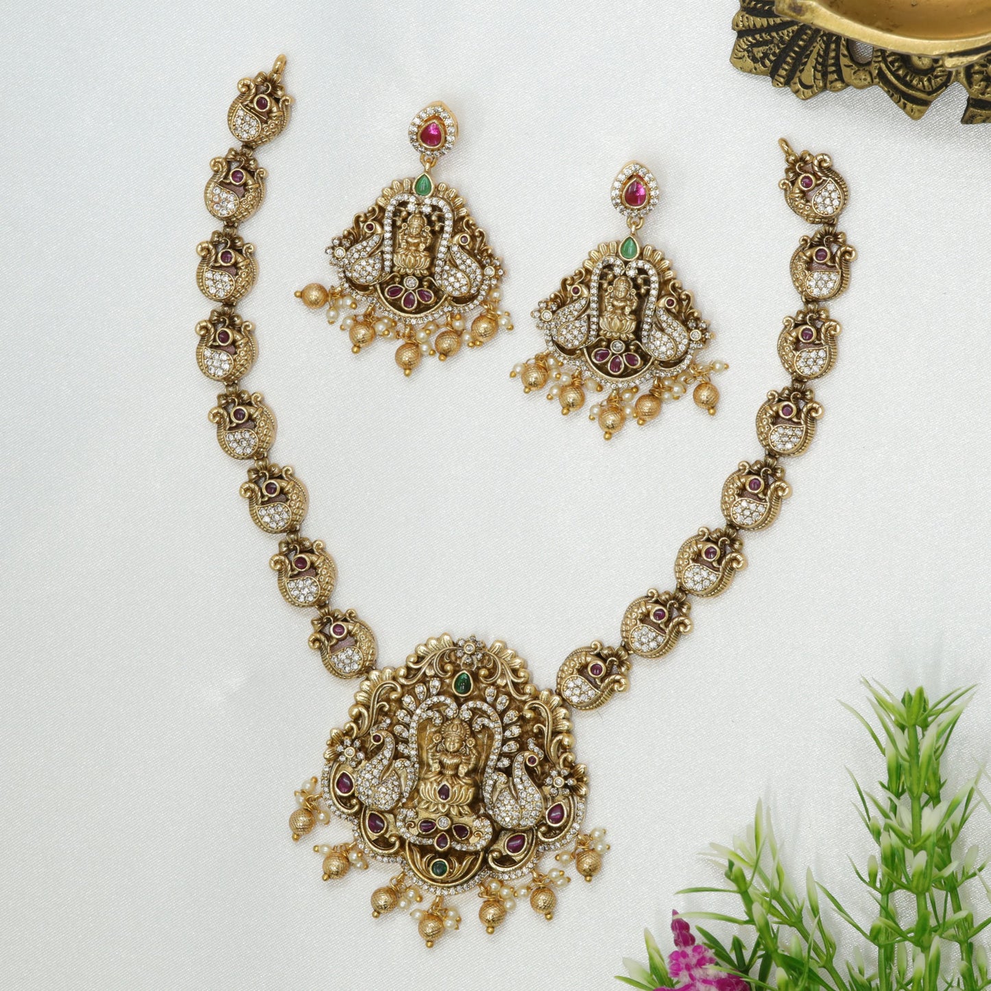 Ornate antique necklace with Lakshmi and peacock artistry