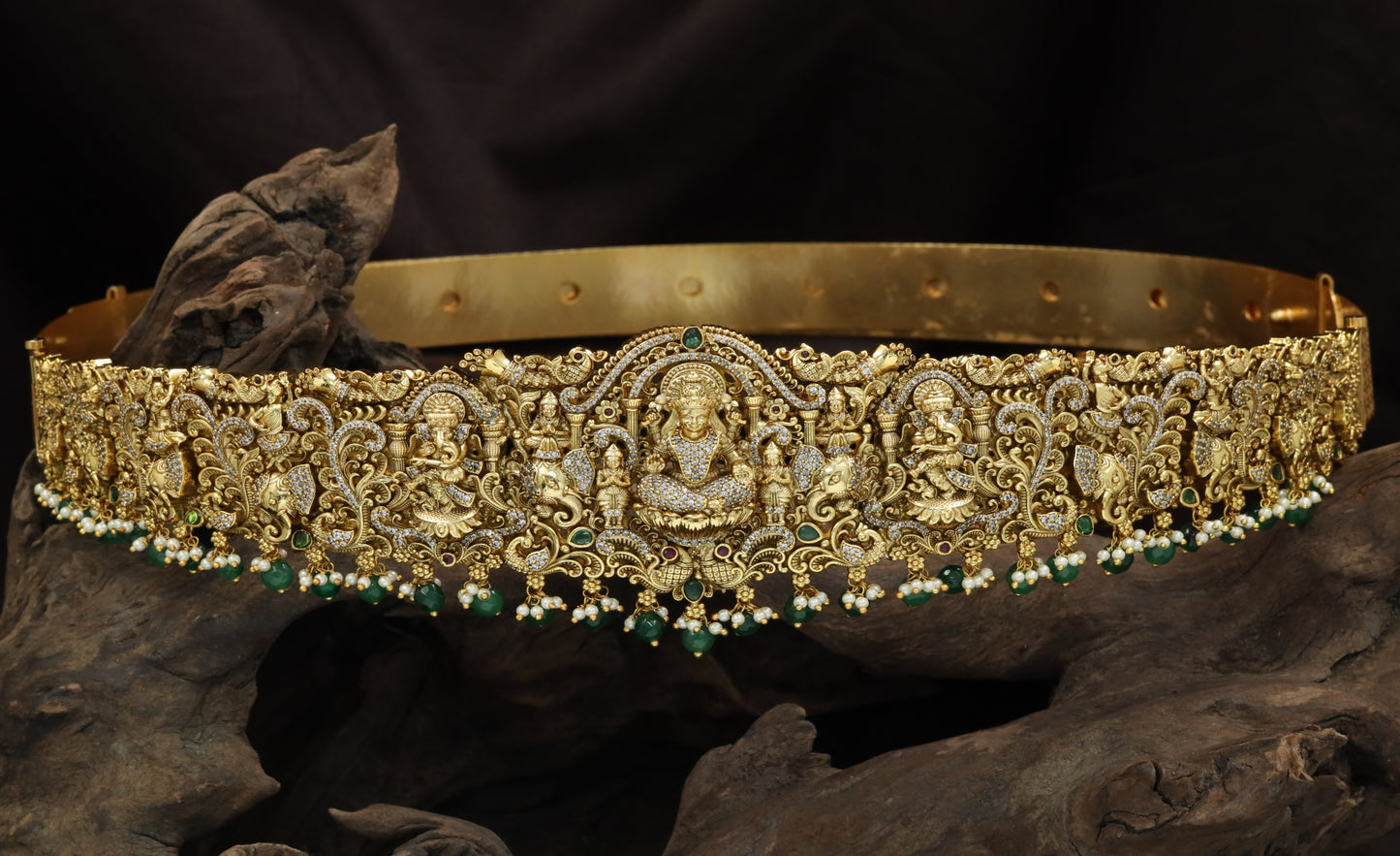 Antique temple dabu with Goddess Lakshmi and Lord Ganesha panels