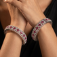 Floral cluster Rhodium bangles with architectural styling