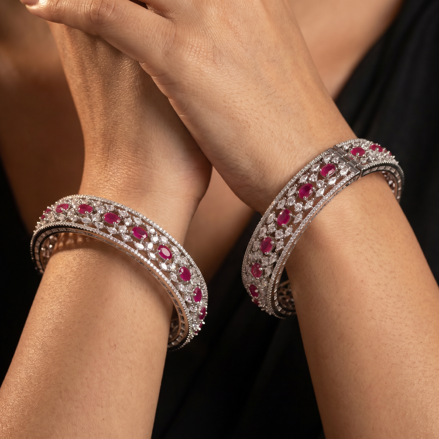 Floral cluster Rhodium bangles with architectural styling