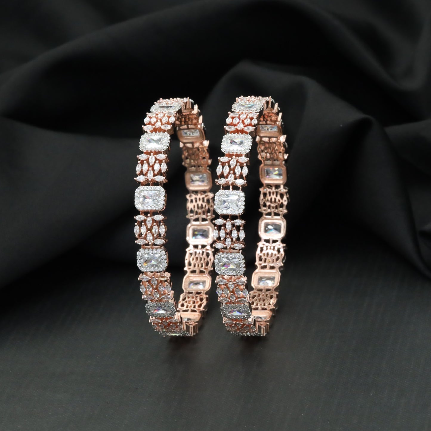 Cushion cut tennis bangles with marquise cluster detailing