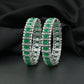 Rectangular station bangles with continuous halo border