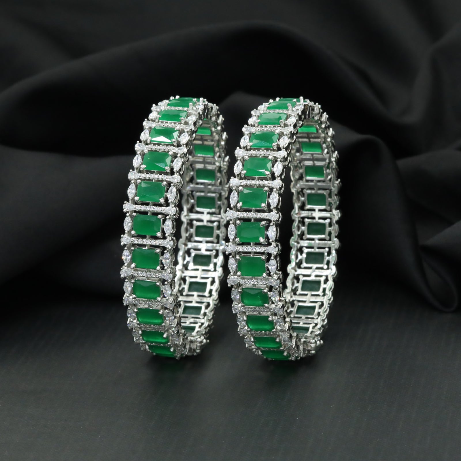 Rectangular station bangles with continuous halo border