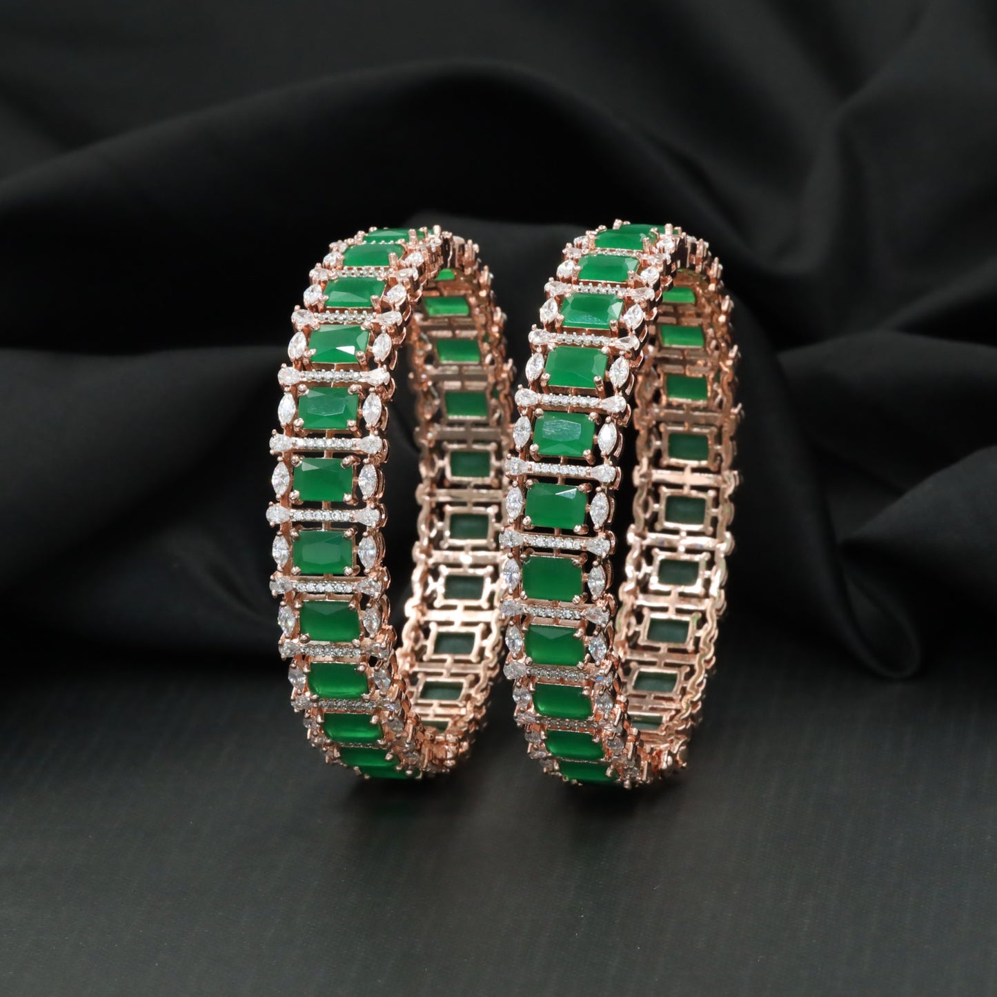 Rectangular station bangles with continuous halo border