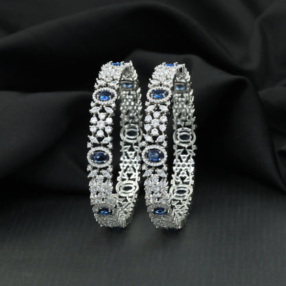 Designer Rhodium bangles with oval halo stations