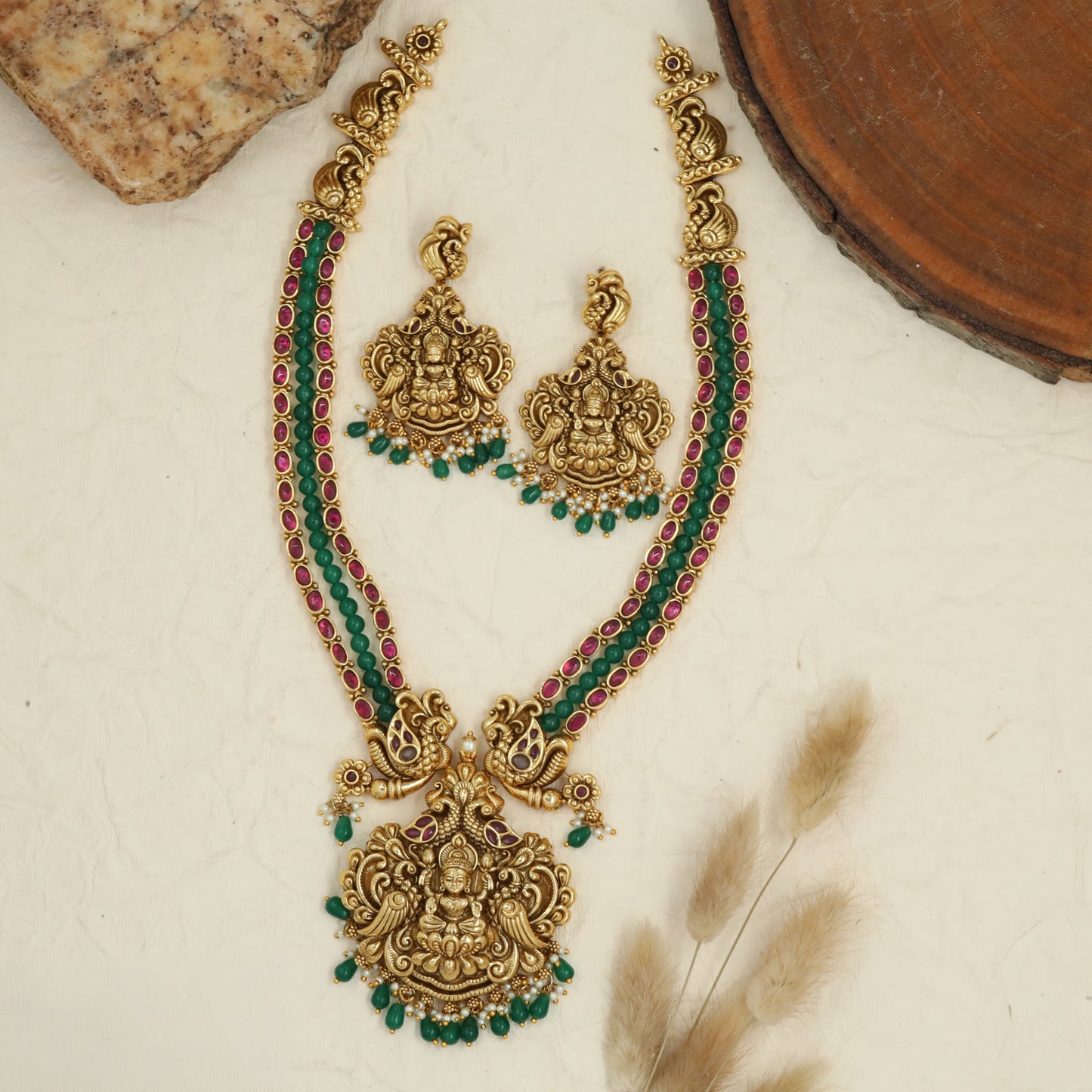 Antique Lakshmi long haara with twin peacock links and ornate goddess pendant