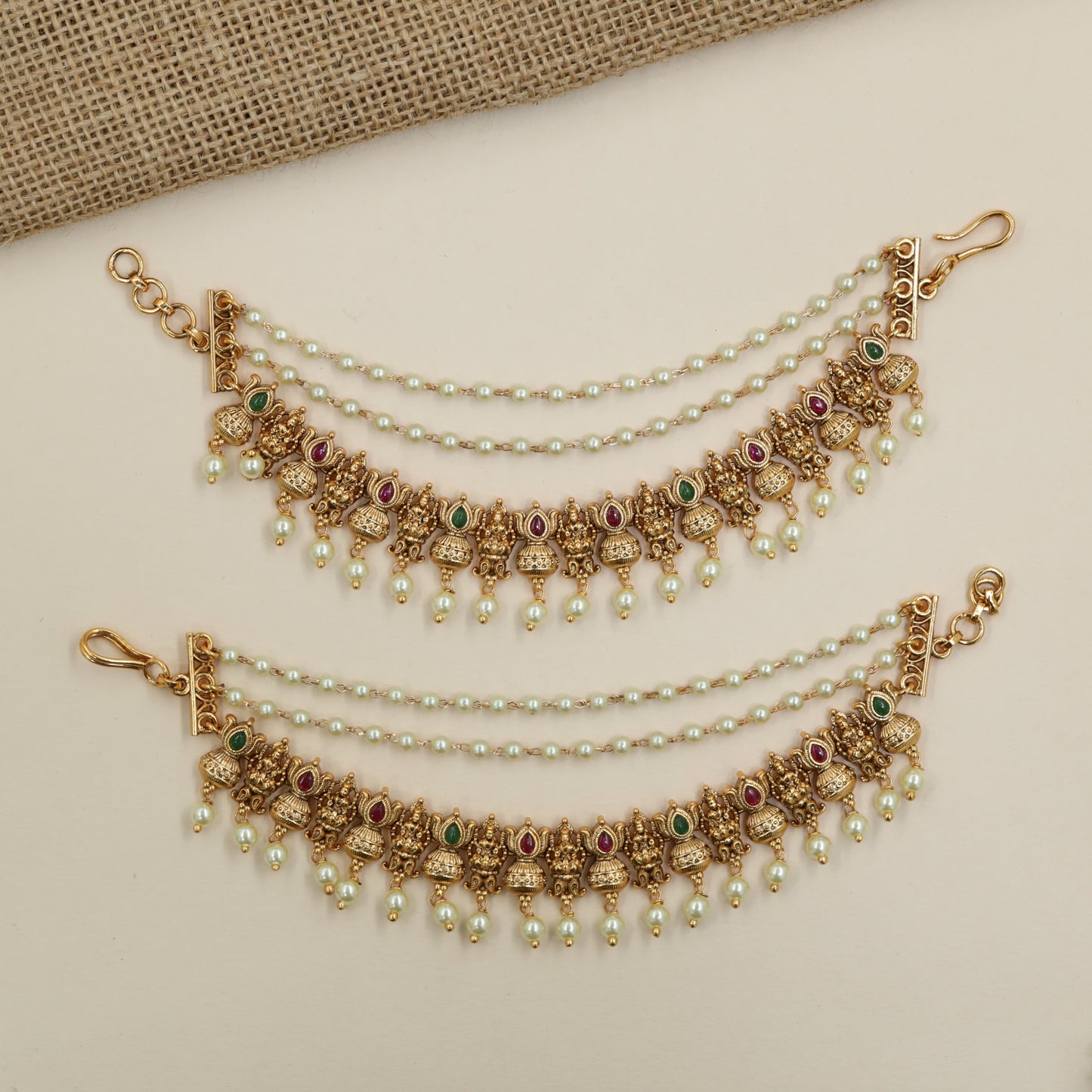 Traditional pearl mati with Lakshmi motif arrangement