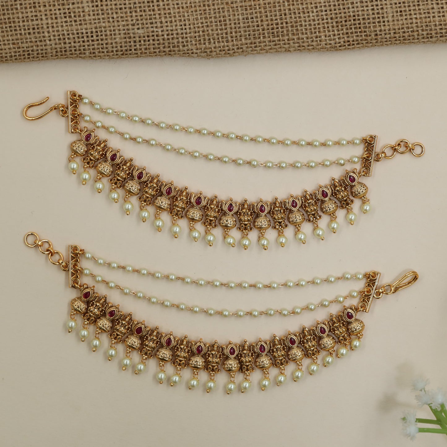 Traditional pearl mati with Lakshmi motif arrangement