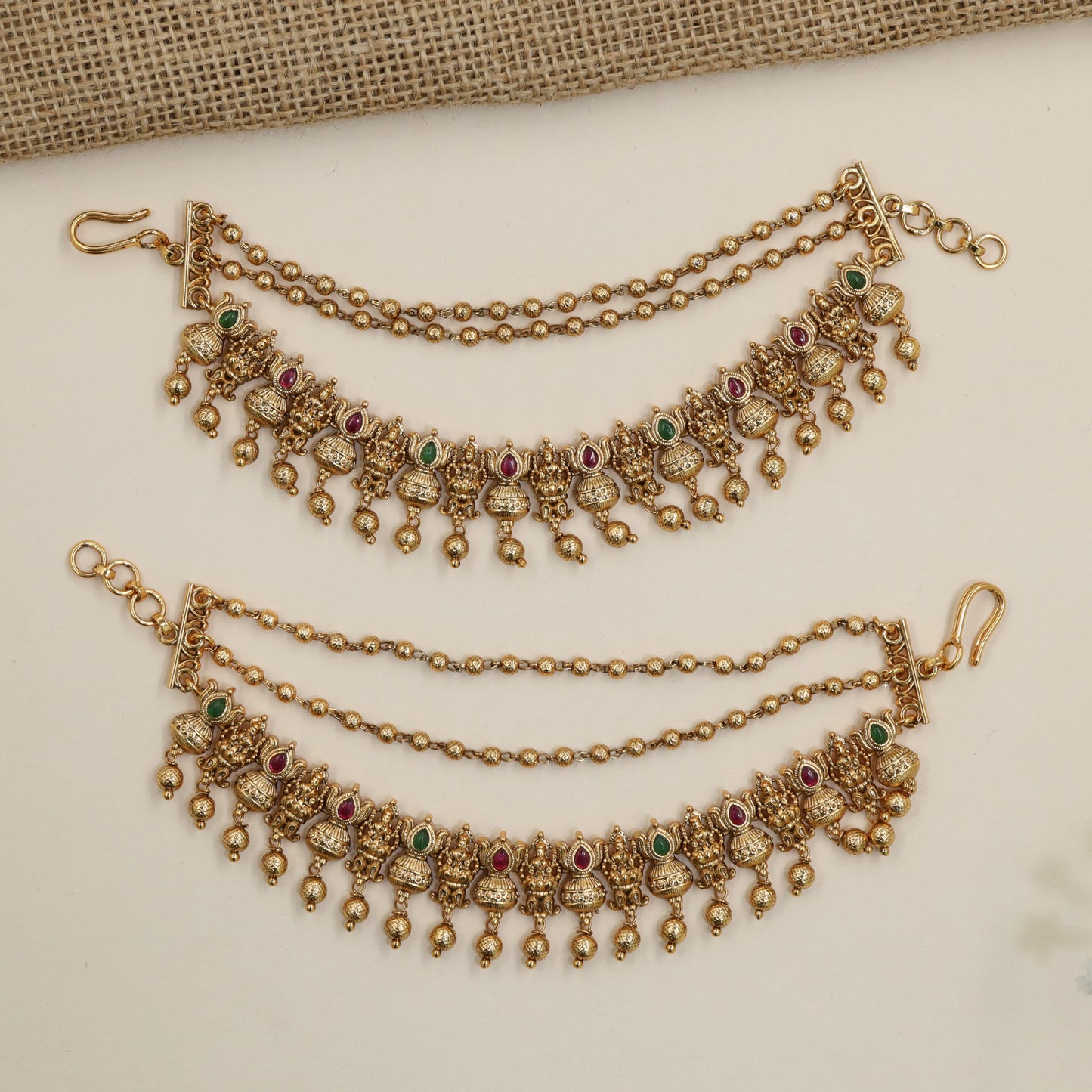 Traditional pearl mati with Lakshmi motif arrangement