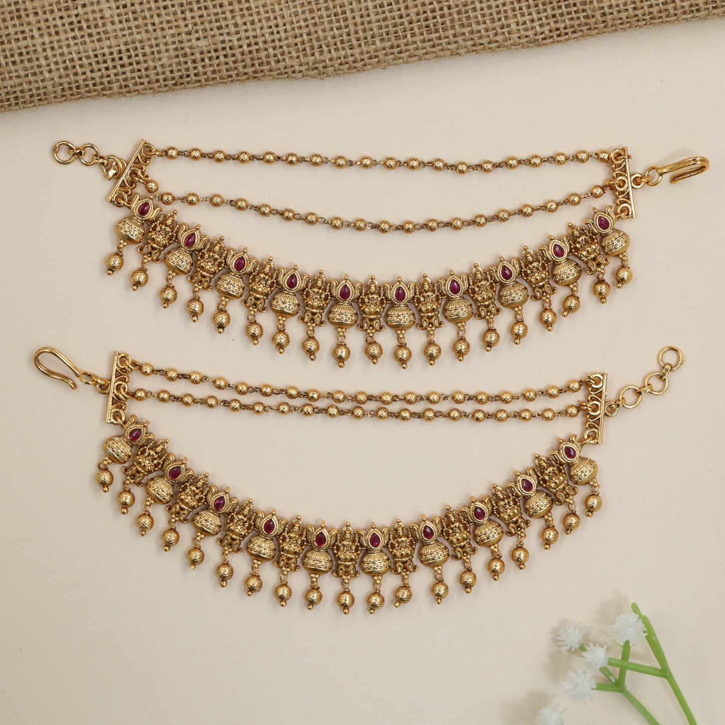 Traditional pearl mati with Lakshmi motif arrangement
