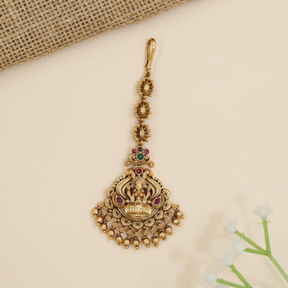 Antique Lakshmi tikka with ornate scrollwork and cascading bead fringe