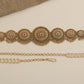 Statement waist belt with graduated medallion craftsmanship