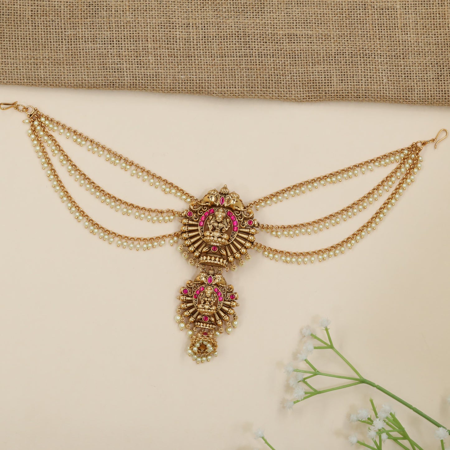 Statement jade bille with temple-inspired Lakshmi motif
