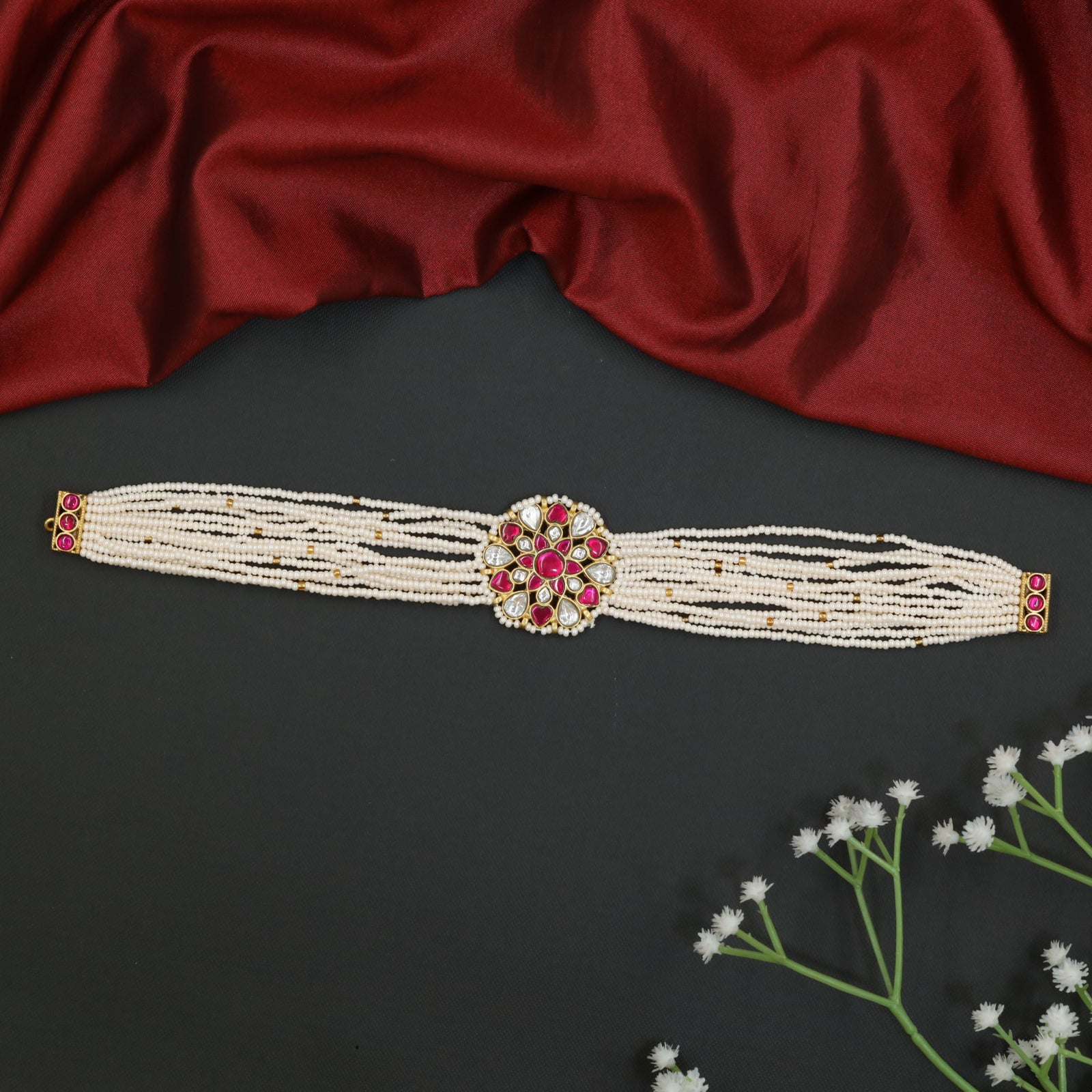 Floral jadau beads choker with multi-strand pearl design