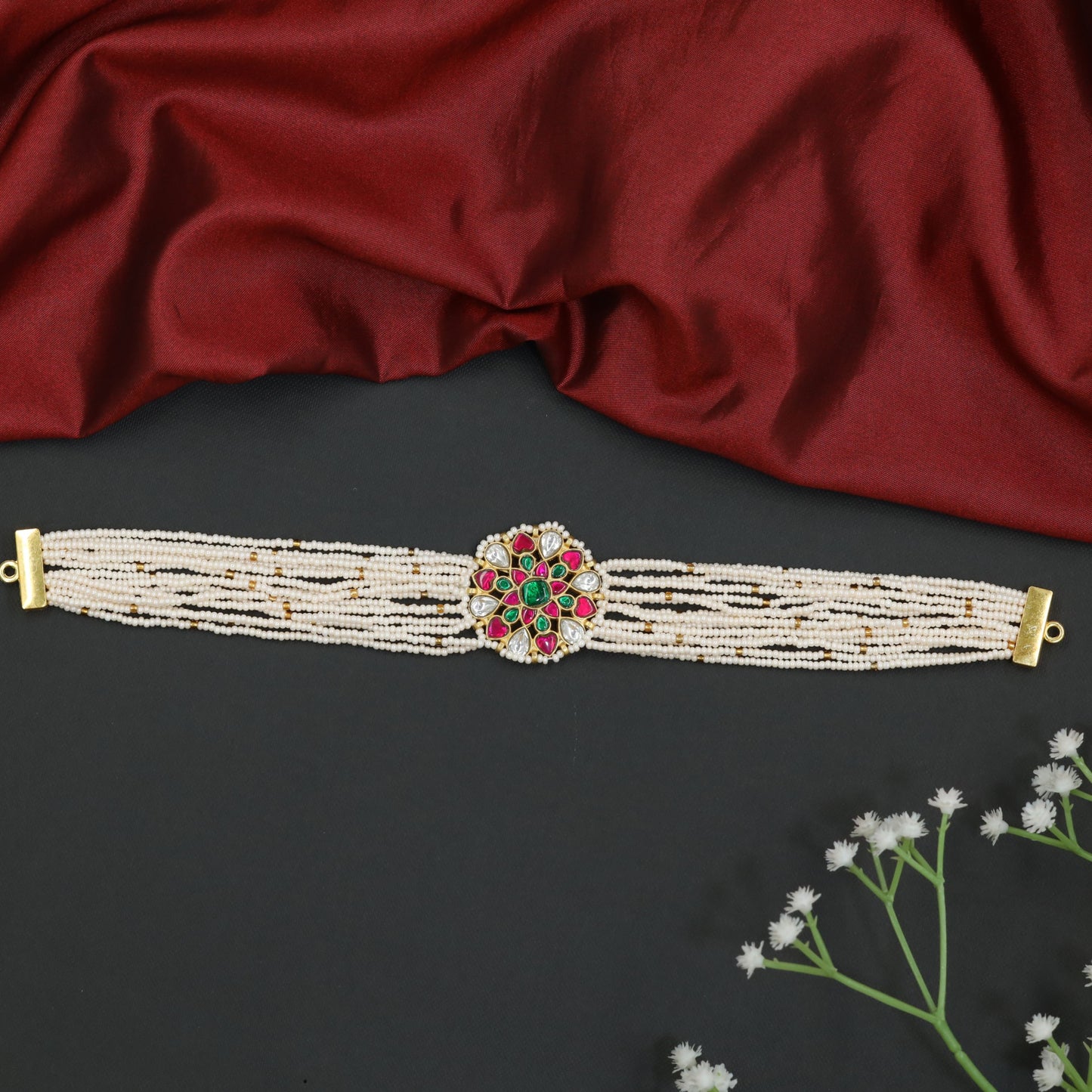 Floral jadau beads choker with multi-strand pearl design