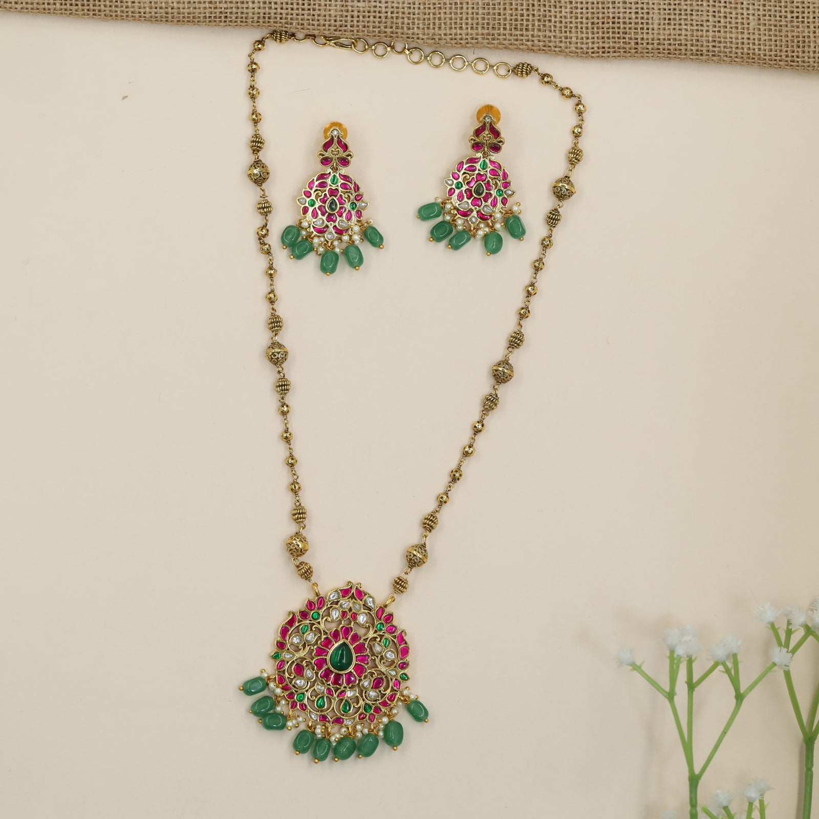 Grand Jadau chain with statement floral pendant and ornamental bead fringe