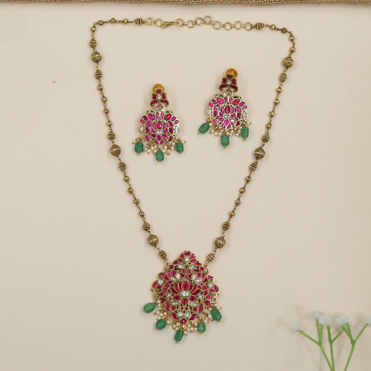 Classic Jadau chain with lotus medallion and decorative hanging beads