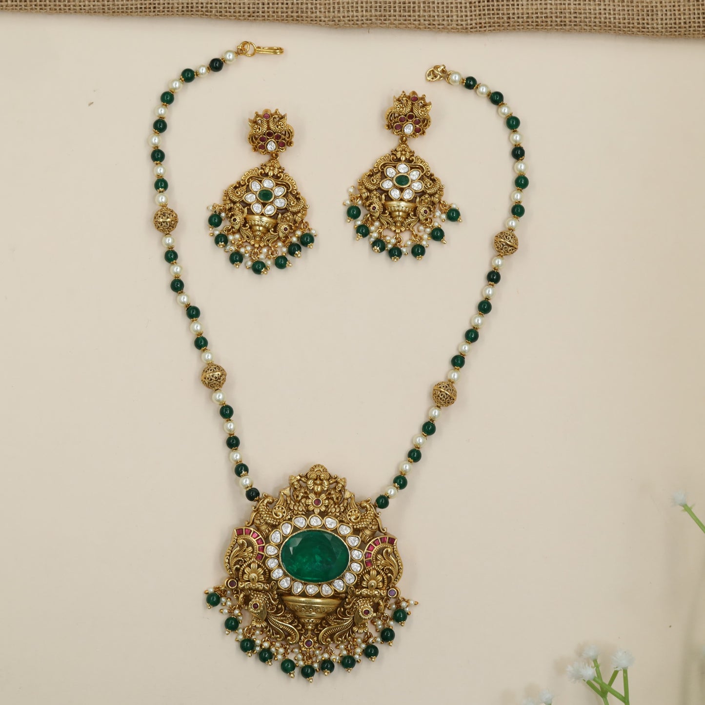 Classic antique chain with ornate floral centerpiece and artisan finish