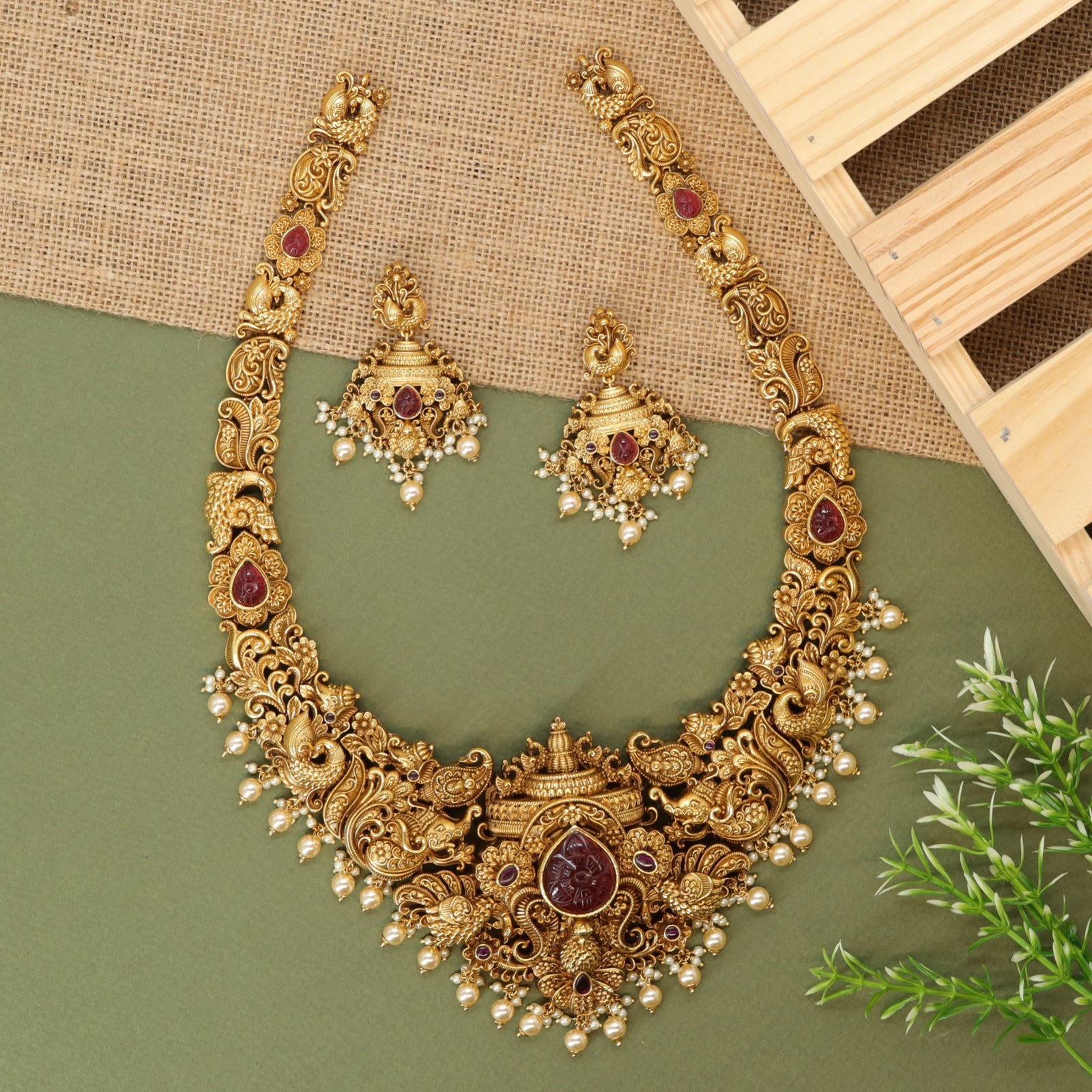 Statement temple long haram with layered carvings and drop beads