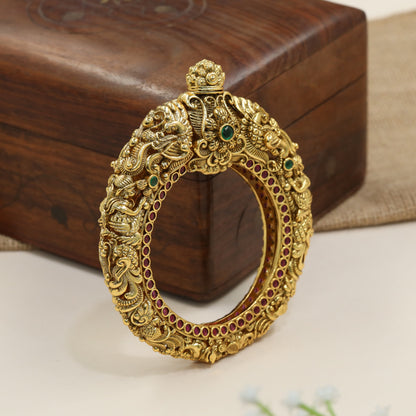 Ornamental antique kada with heritage carvings and raised cobra design