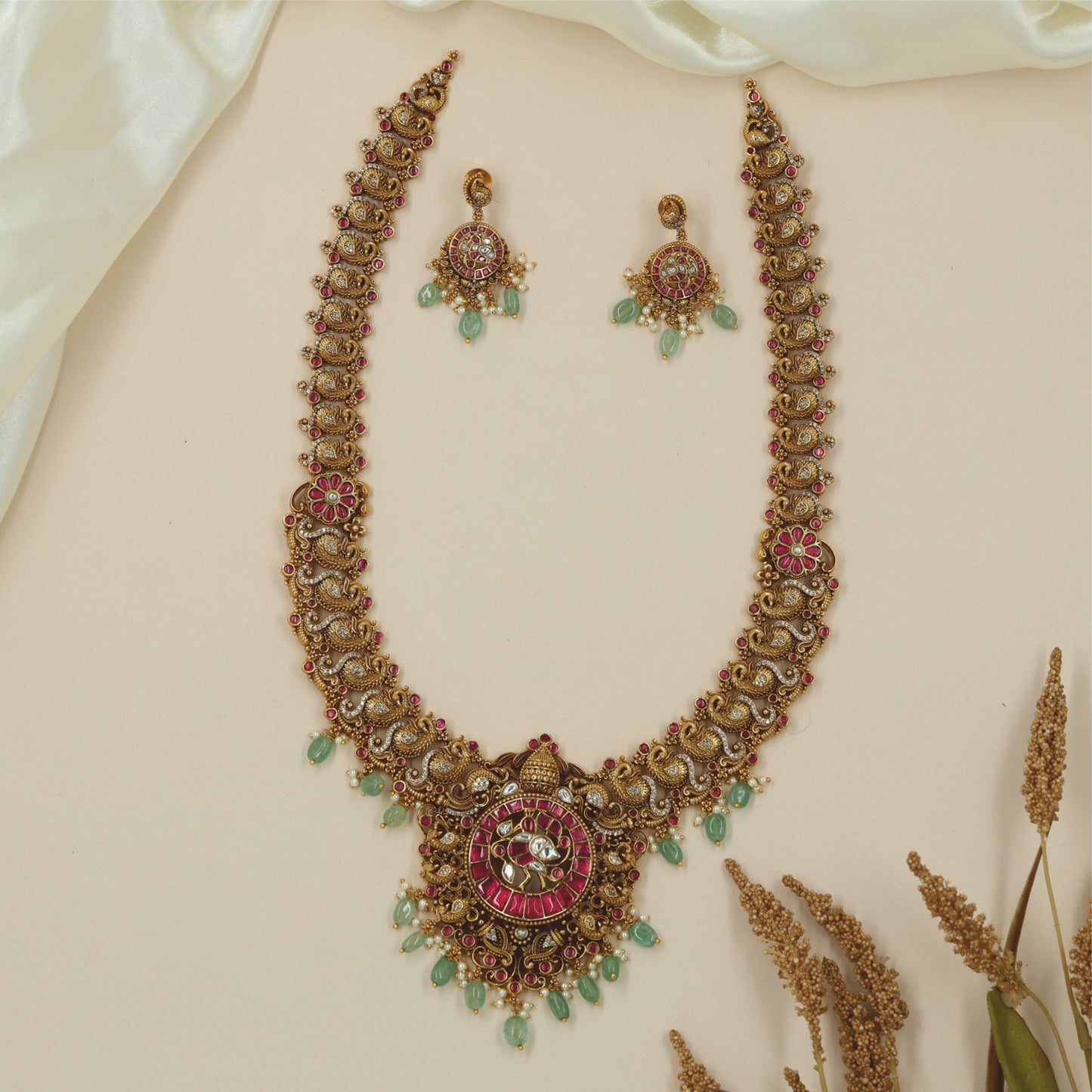 Antique peacock necklace with floral medallion pendant and yali links