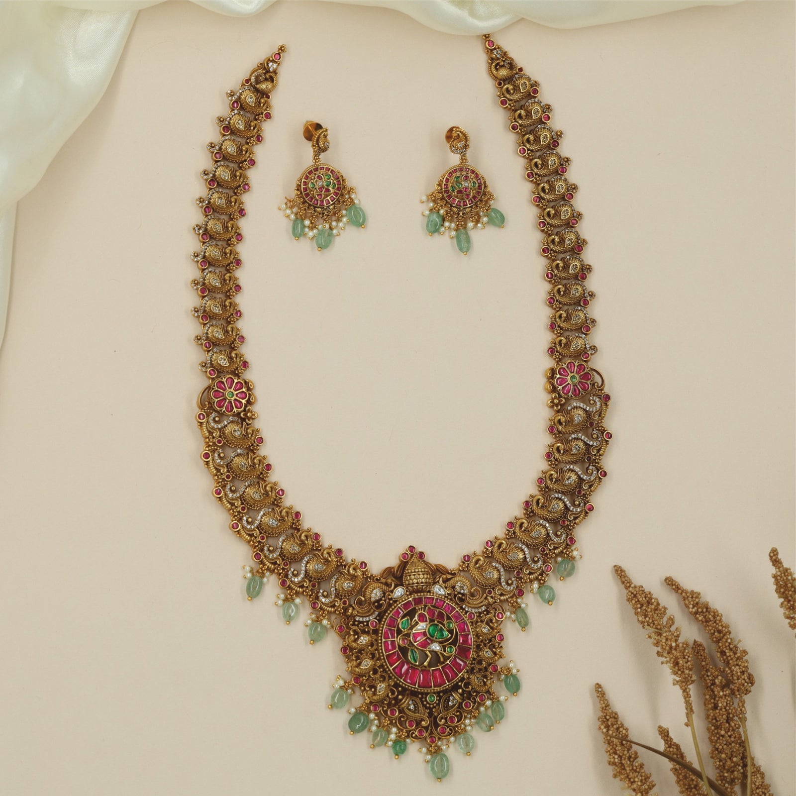 Antique peacock necklace with floral medallion pendant and yali links
