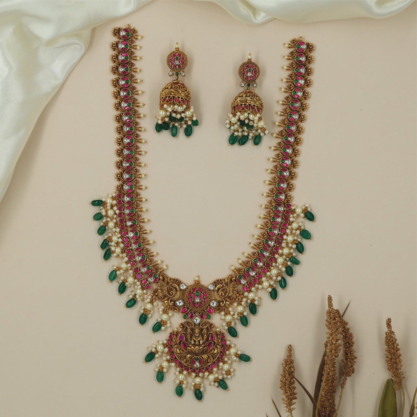 Grand temple long haara with sculpted Lakshmi centre and artisan detailing
