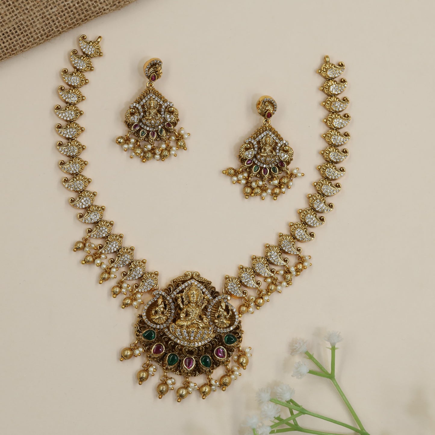 Bridal Lakshmi necklace with handcrafted paisley links and statement pendant