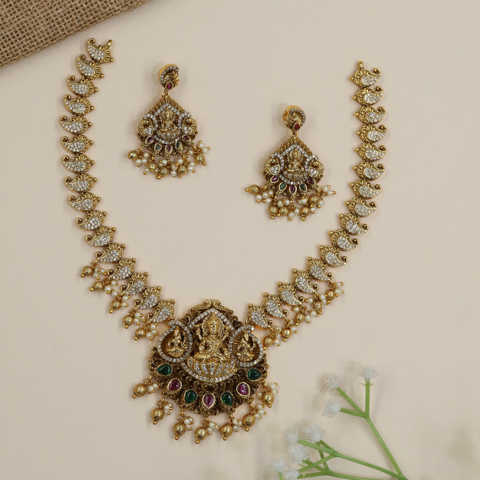 Bridal Lakshmi necklace with handcrafted paisley links and statement pendant