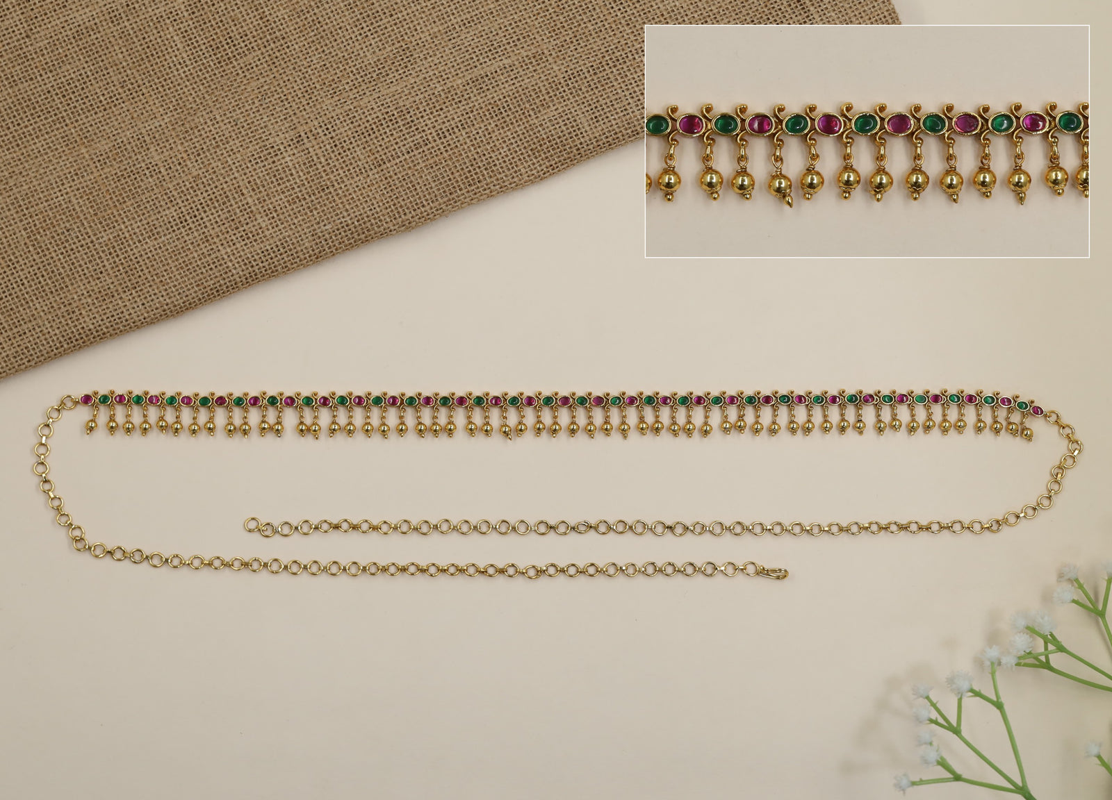 Grand antique waist belt with continuous oval design and hanging ghungroos