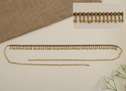 Grand antique waist belt with continuous oval design and hanging ghungroos