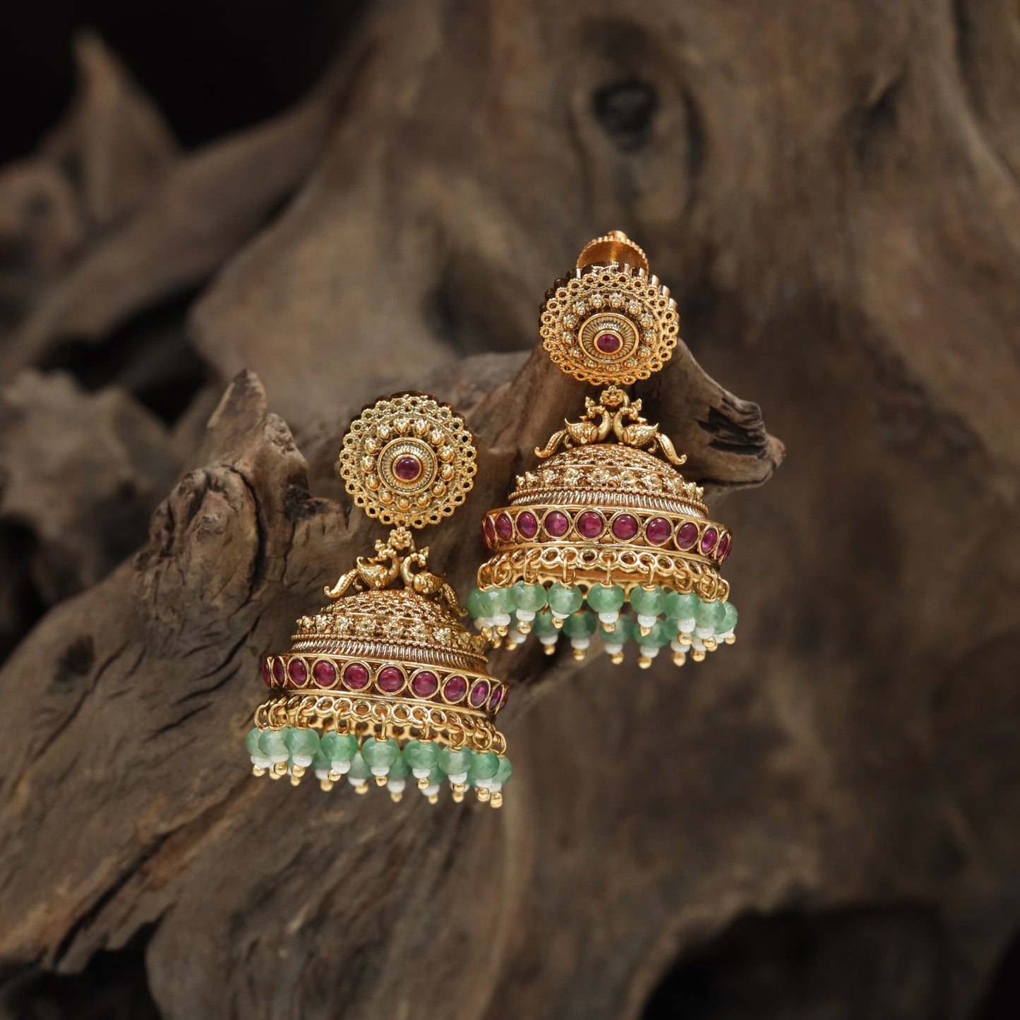 Classic jhumka with circular crest and layered bell detailing