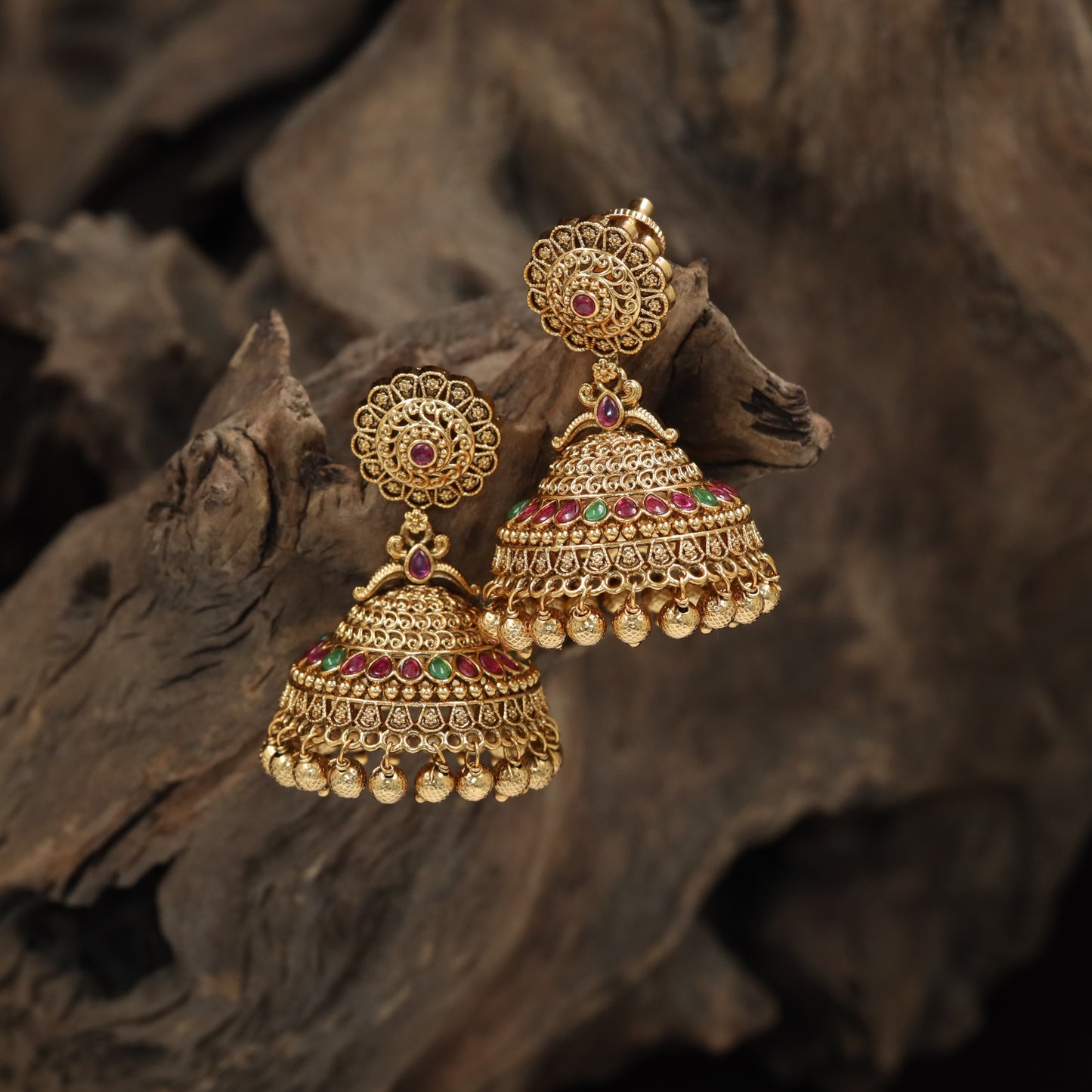 Intricate jhumka with floral medallion top and layered dome design