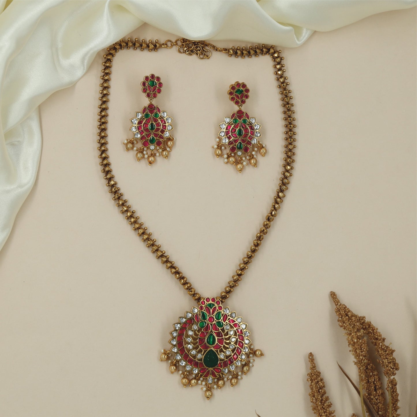 Heritage jadau chain with peacock centrepiece and bead drop accents