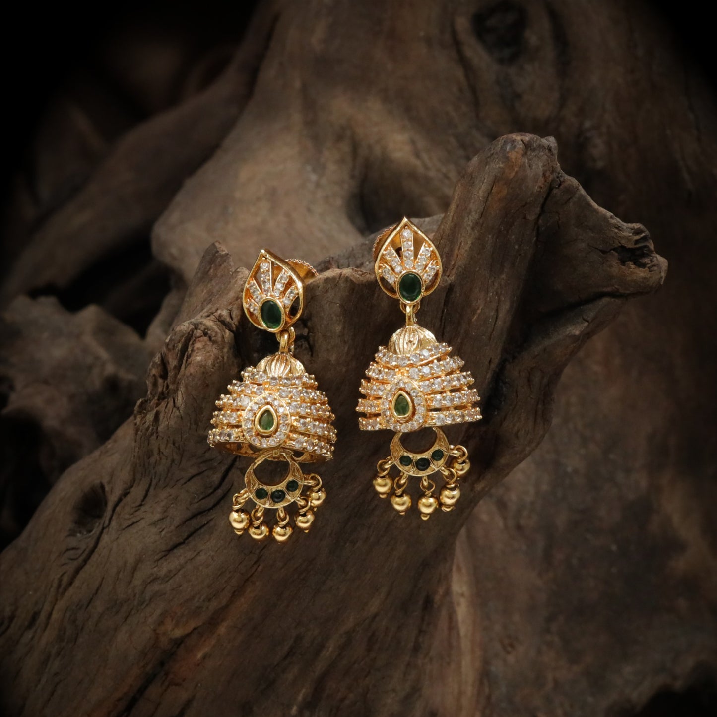 Antique jhumka with leaf stud and structured layered bell design