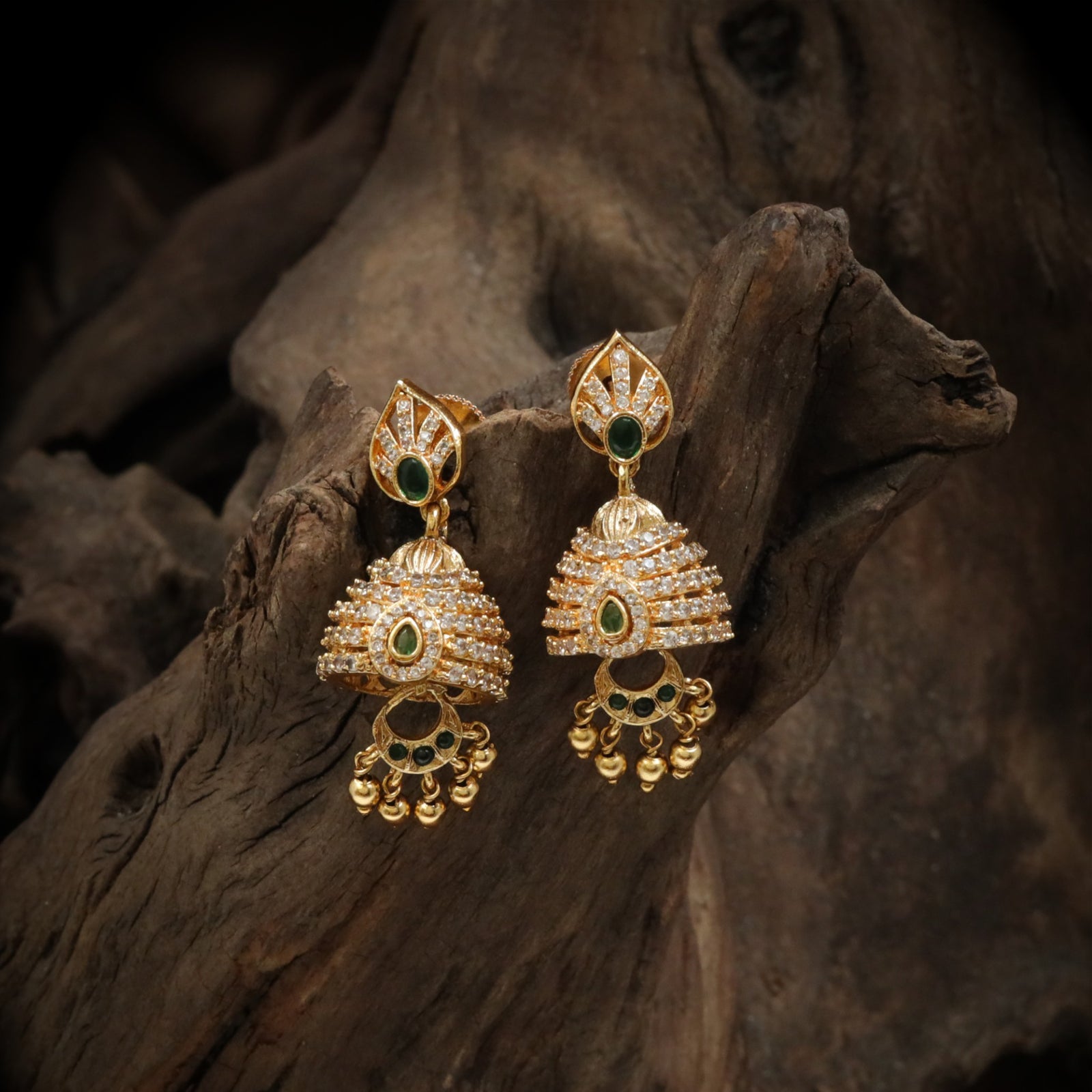 Antique jhumka with leaf stud and structured layered bell design
