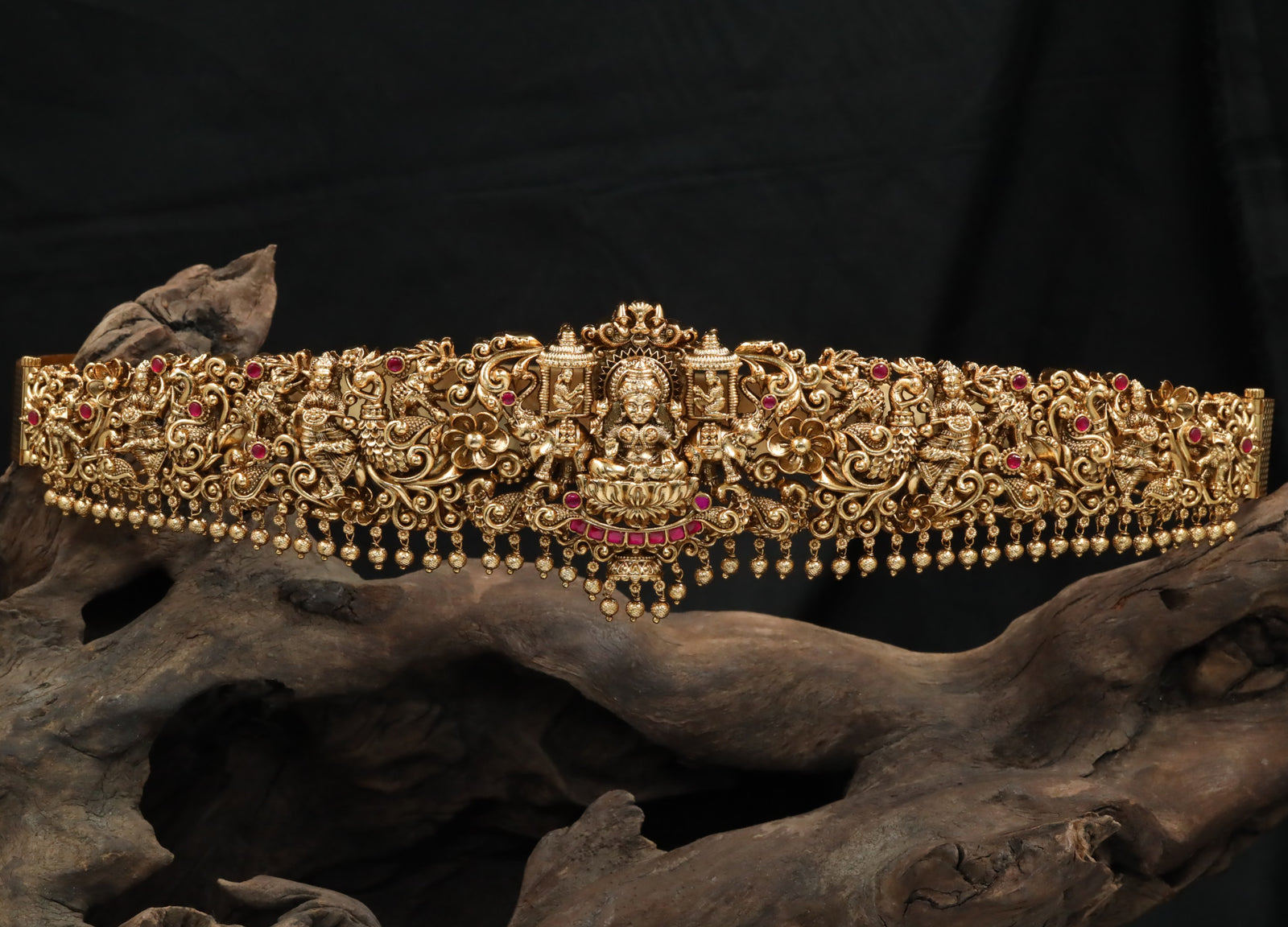 Grand Antique dabu with sculpted temple motifs and bead fringe