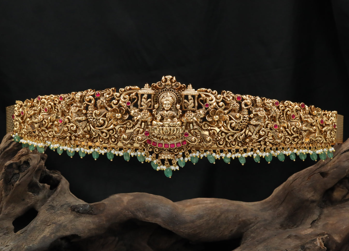 Grand Antique dabu with sculpted temple motifs and bead fringe