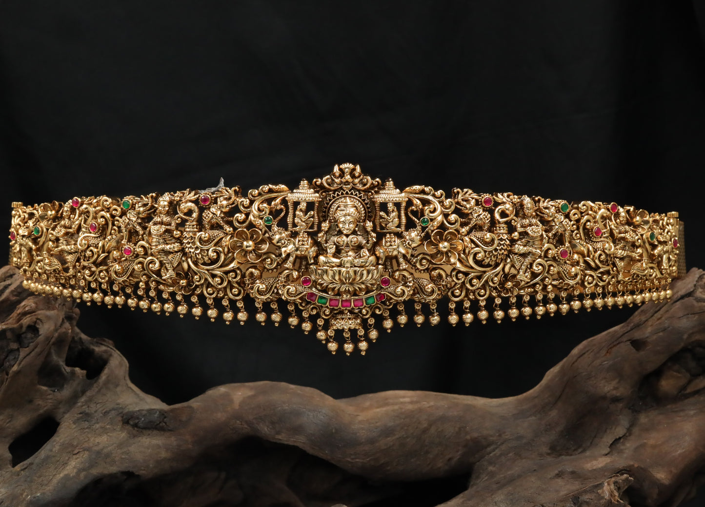 Grand Antique dabu with sculpted temple motifs and bead fringe