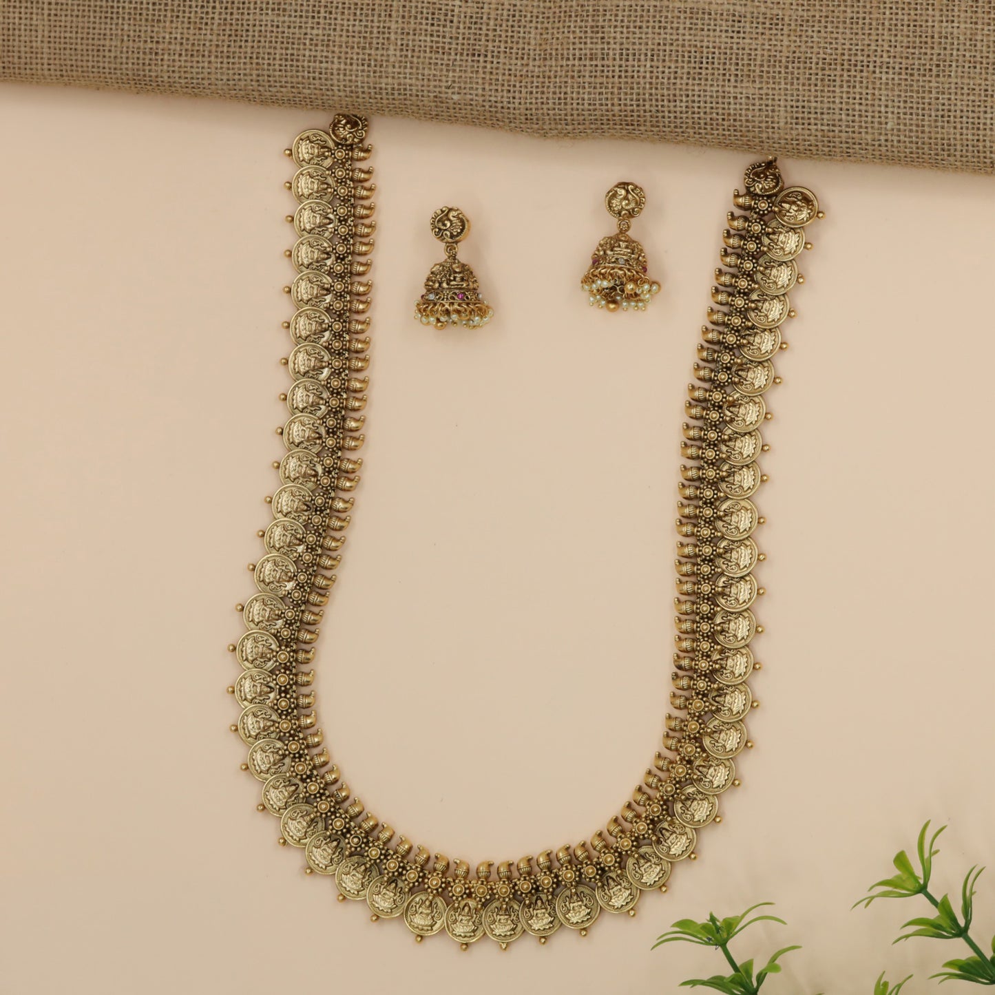 Grand Antique Long Haara with Traditional Coin-Inspired Styling