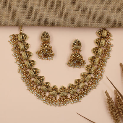 Sculpted Antique Necklace Featuring Leaf Panels and Pearl Fringe Detailing
