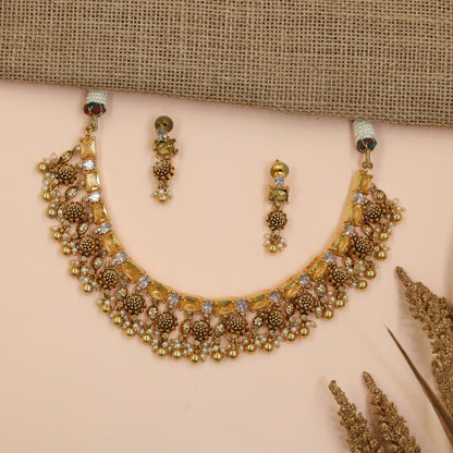 Floral Antique Necklace Featuring Baguette-Cut Stone Pattern and Ornate Fringe